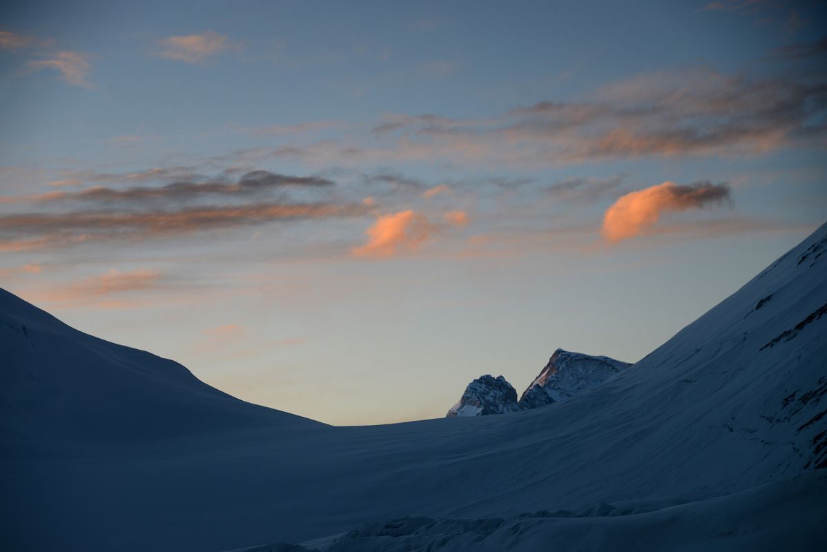 14 The First Light Of Sunrise Burns The Scattered Clouds Orange Above The Raphu La And Chomolonzo From Mount Everest North Face Advanced Base Camp 6400m In Tibet